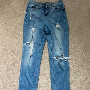 Medium wash mom jeans with rips